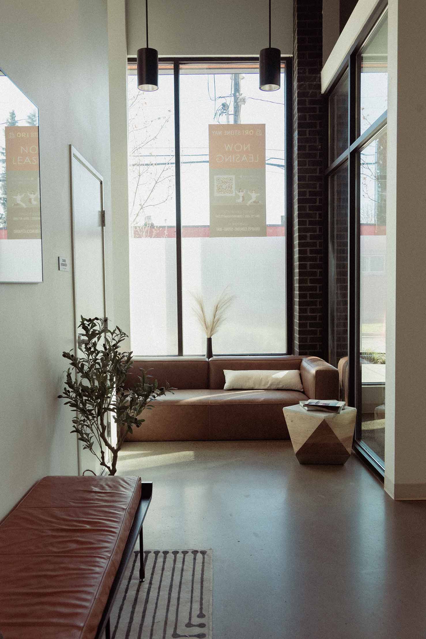 First-floor residential hallway with sofa